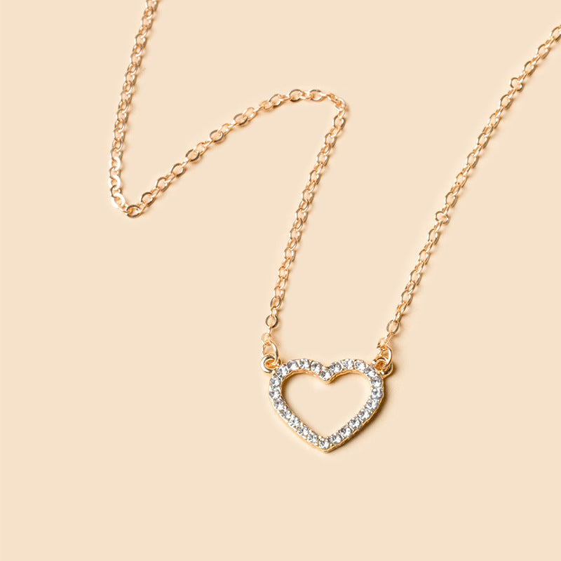 Wholesale heart necklaces: versatile european & american style jewelry, hollow-carved, diamond-accented, multi-layered alloy choker necklace - trendy ins style