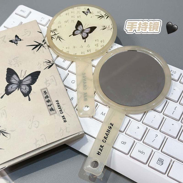 HERORANGE~ Mo Dieying heart mirror simple high definition handle mirror portable creative makeup mirror handheld mirror