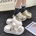 Cute floral puff buckle clogs women's summer outdoor wear 2025 new thick sole "stomping on shit" comfort closed-toe eva sandals