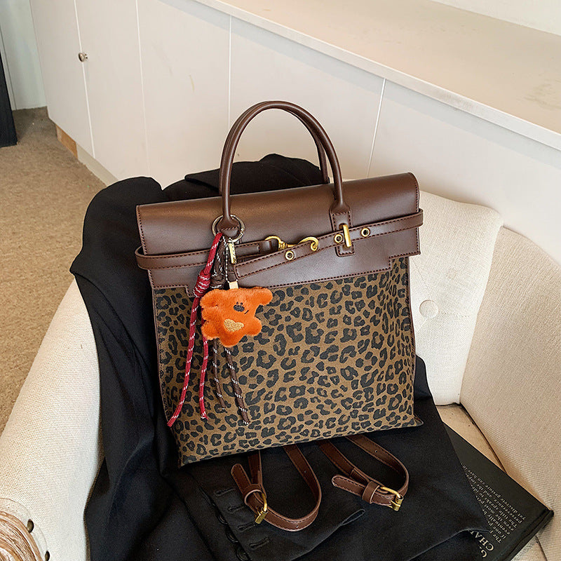 Retro fashion briefcase women 2025 new leopard print backpack large capacity commuting versatile senior sense student bag