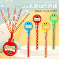 Hand holding smiling face 32-hole bubble wand blowing bubble toy opening five claws large bubble blowing machine toy cross-border popular model