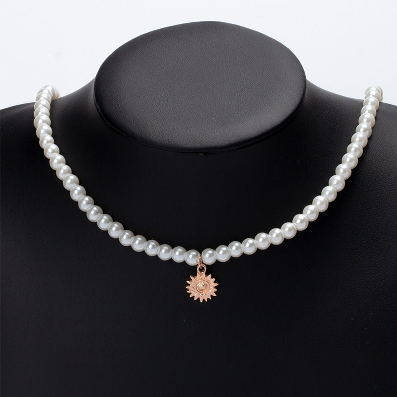 Pearl necklace wholesale fashion cross-border pendant jewelry alloy sun niche light luxury high-end sweater necklace for women