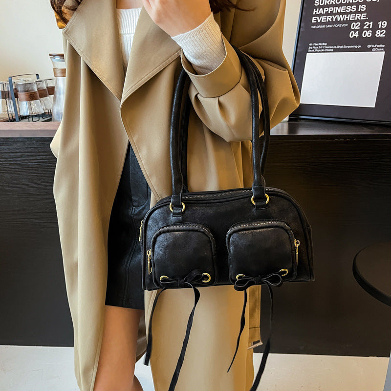 Simple retro underarm bag women's 2025 winter new Korean version niche portable commuter shoulder bag