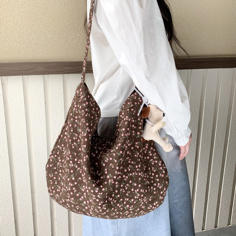 Cross-border new broken flower canvas bag messenger bag shopping bag fashion trend large capacity casual versatile women's shoulder bag