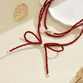 European and american cross-border red beaded bow necklace - luxury, unique design, stackable heart pearl jewelry necklace