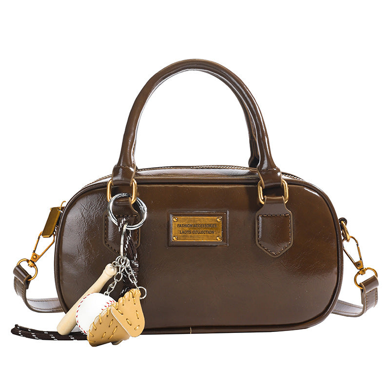 Spring new trend casual shoulder handle women's Korean version fashion commuter women's messenger bag versatile bowling bag