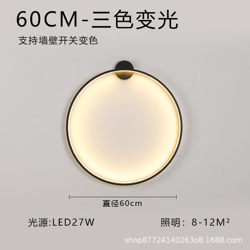 Minimalist chic large round wall sconce - stylish ambient lighting for living room backdrops, bedroom headboards, and more
