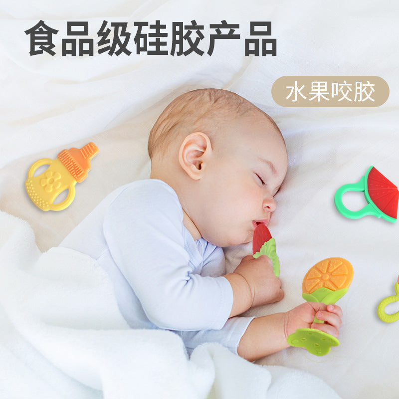 Baby fruit toothpaste baby molar stick food grade silicone biting glue manufacturer two-color three-dimensional strawberry biting music