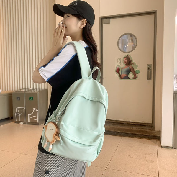 Wholesale fresh and sweet middle and high school students backpack fashion leisure sports backpack solid color women's leisure bag