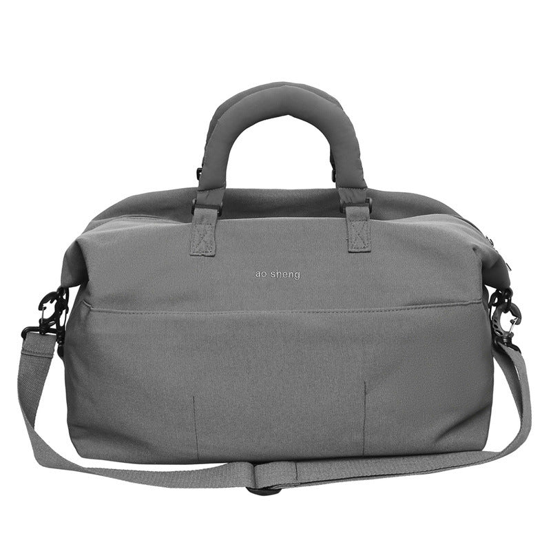 Foreign trade foldable duffel bag bag dry and wet separation messenger bag simple wear-resistant anti-splashing light short-distance bag wholesale