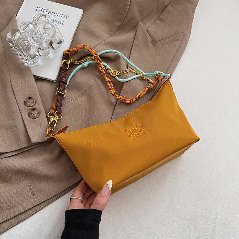 Internet celebrity trend shoulder bag 2025 summer new contrasting color canvas small lunch box bag commuter fashion trend handbag