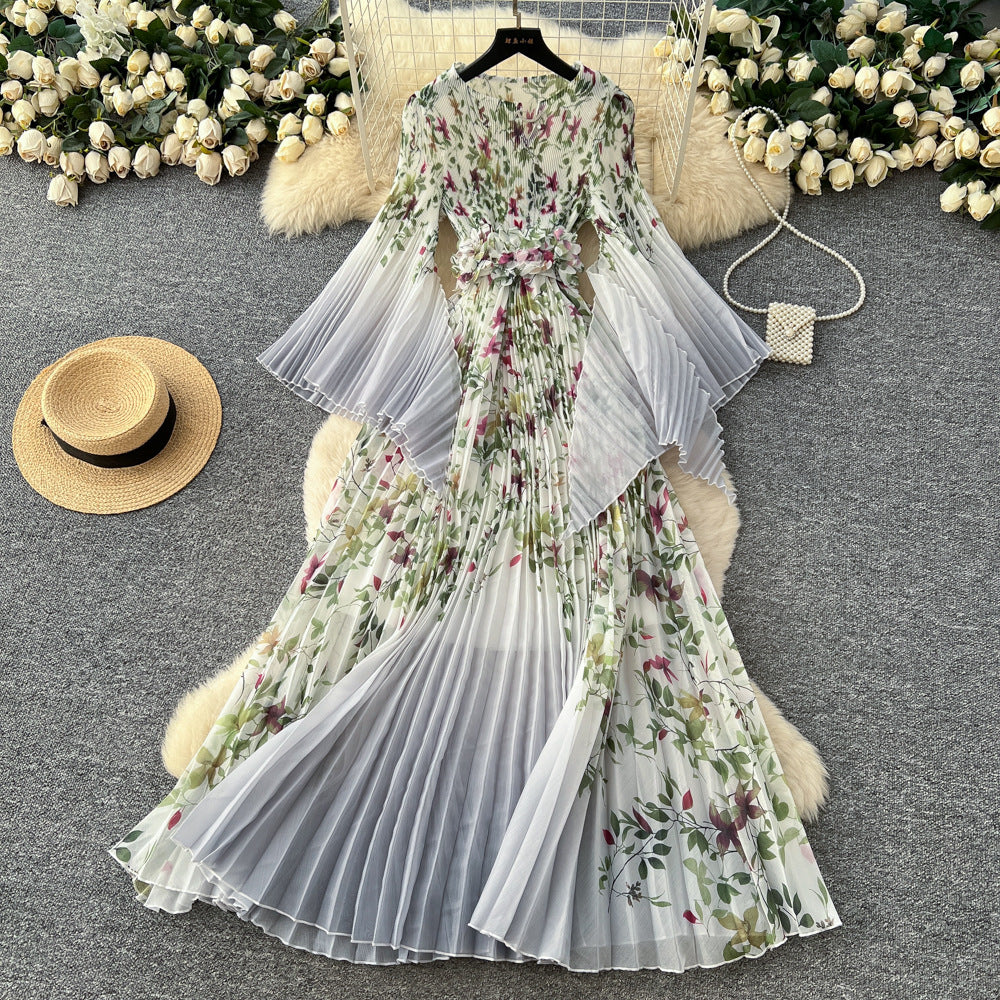 Elegant and stylish flared-sleeve printed dress for women, featuring a cinched waist, pleated detailing, batwing sleeves, and a full, flowing skirt. a sophisticated and versatile dress perfect for the office