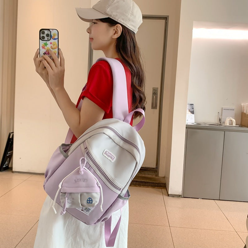 College student schoolbag, junior high school student backpack, women's summer Korean style fashion, large capacity and light high school travel backpack tide