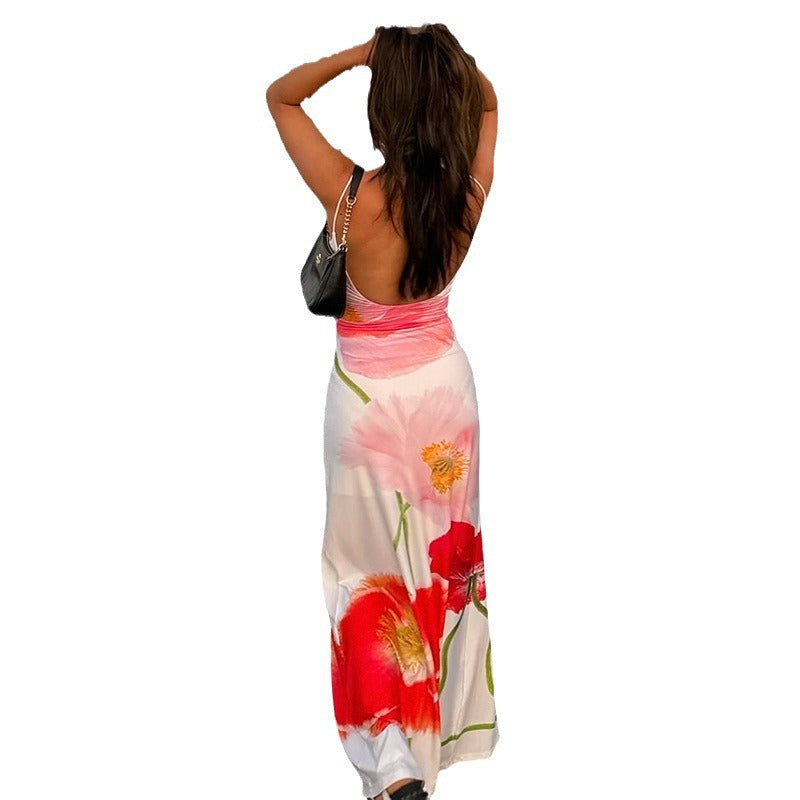 Summer European and American holiday style printing temperament long dress big flower contrasting color suspender backless A-word dress beach dress