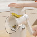 Multifunctional vegetable cutter - hand-cranked, easy to use: shreds, slices, grates potatoes, and grinds nuts