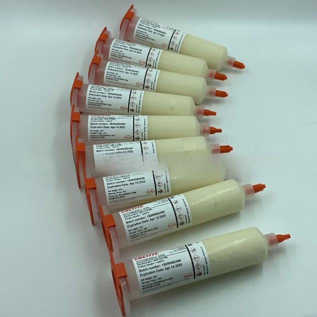 A piece of Loctite E3200 ink cartridge chip is packed with 30CC white glue, and Loctite E3200 epoxy resin glue.