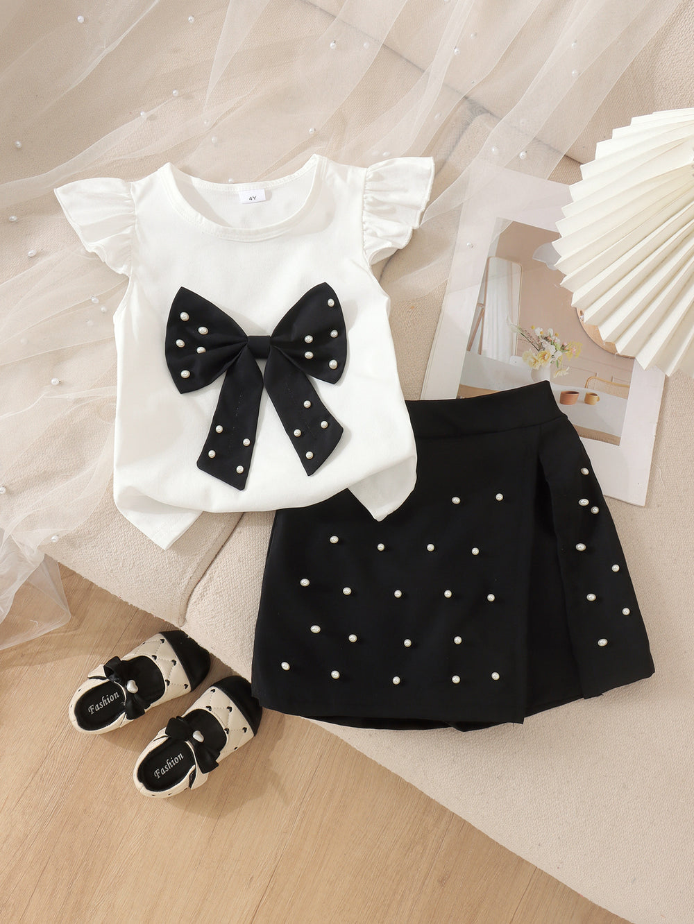 Children's clothing cross-border european and american girls white flying sleeve t-shirt black skirt children's clothing two-piece set