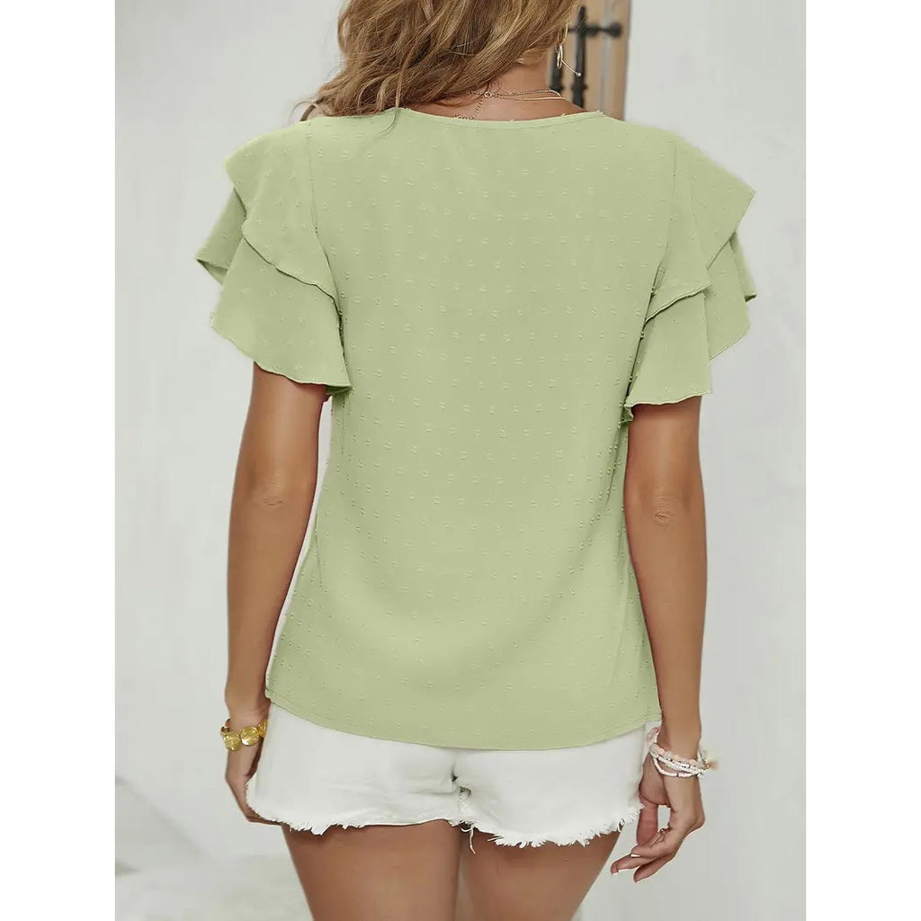 In 2024, the  new  solid-color polka dot hairball round neck shirt will be divided into lotus leaf sleeves and elegant temperament style