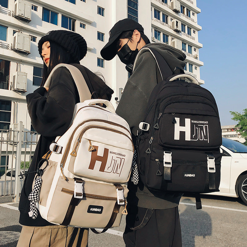 New backpack, junior high school, male and female students, campus schoolbag, large capacity, fashion trend, strong and durable leisure bag