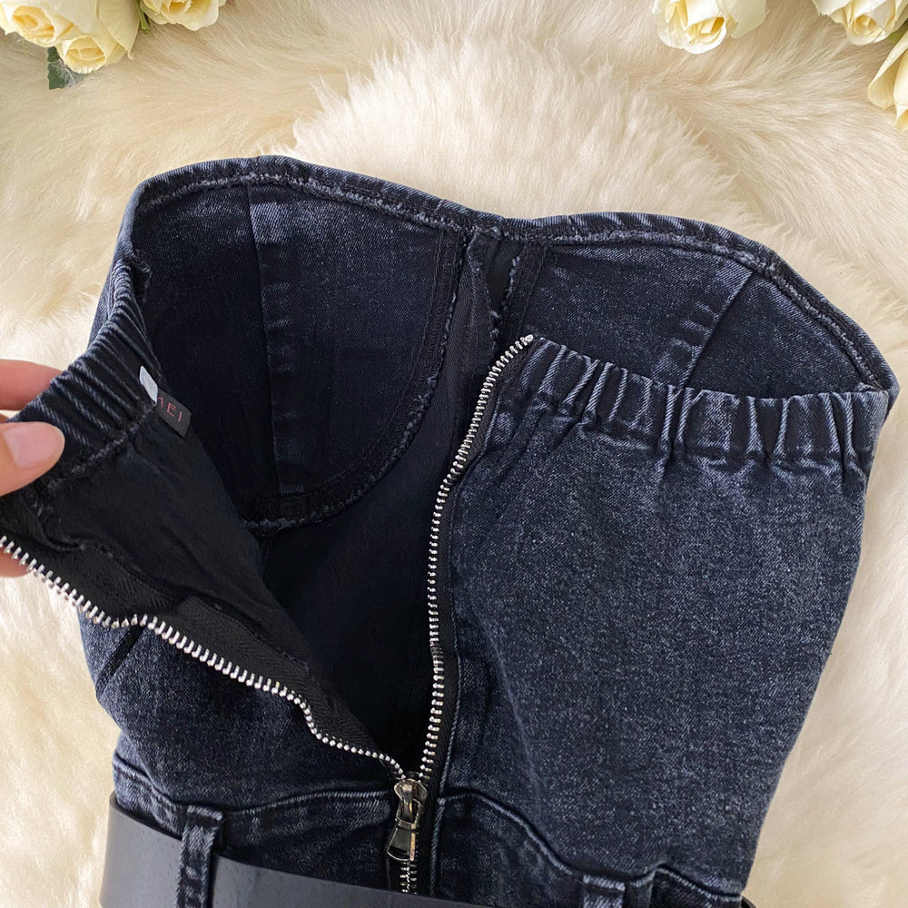 This year's trendy look for petite women: stylish, high-waisted, slim-fit, sleeveless, strapless jumpsuit with hot-fix rhinestone embellishments