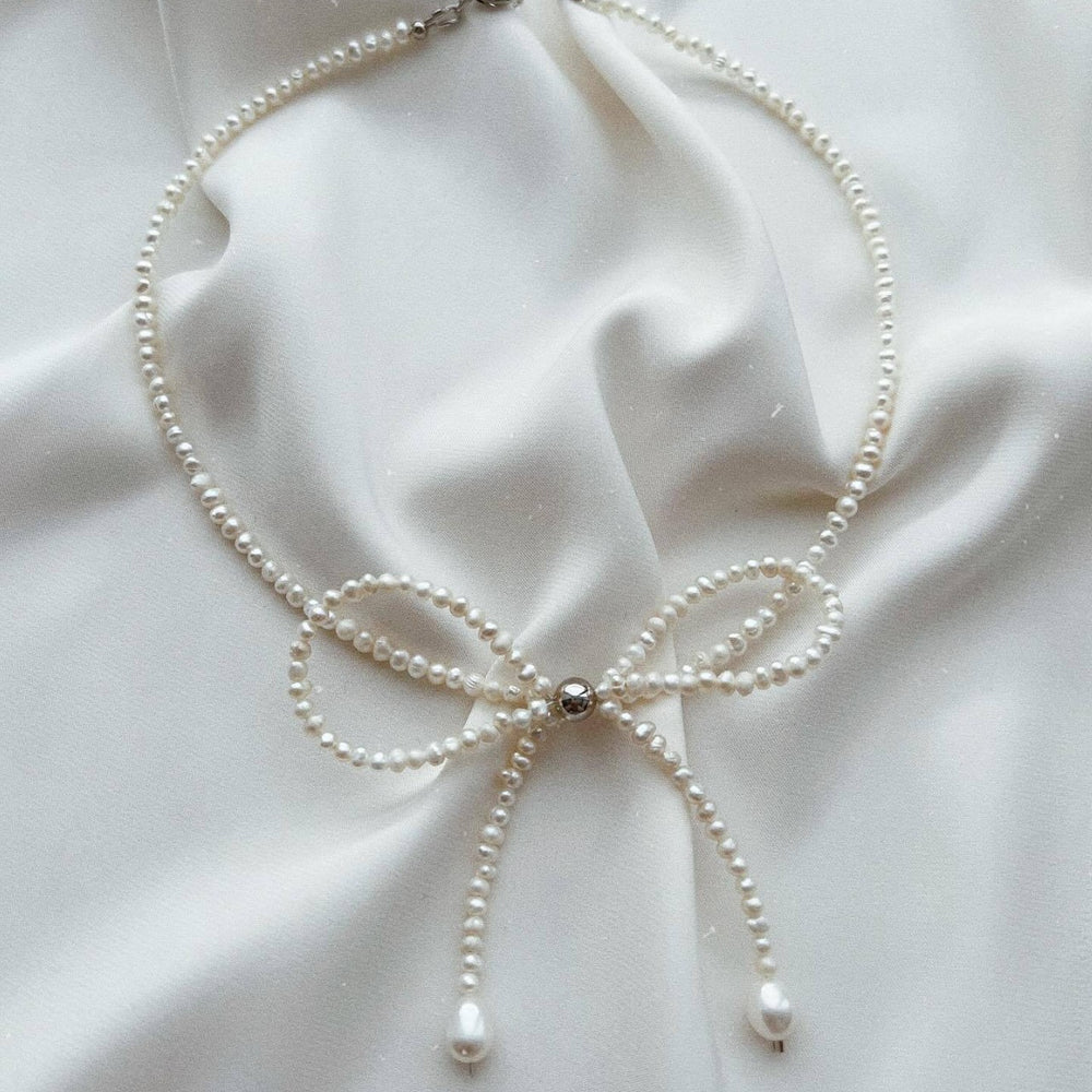 Bow choker necklace female fashion elegantsweet imitation pearl string chain niche styleclassy fairy style necklace