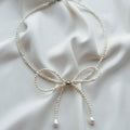 Bow choker necklace female fashion elegantsweet imitation pearl string chain niche styleclassy fairy style necklace