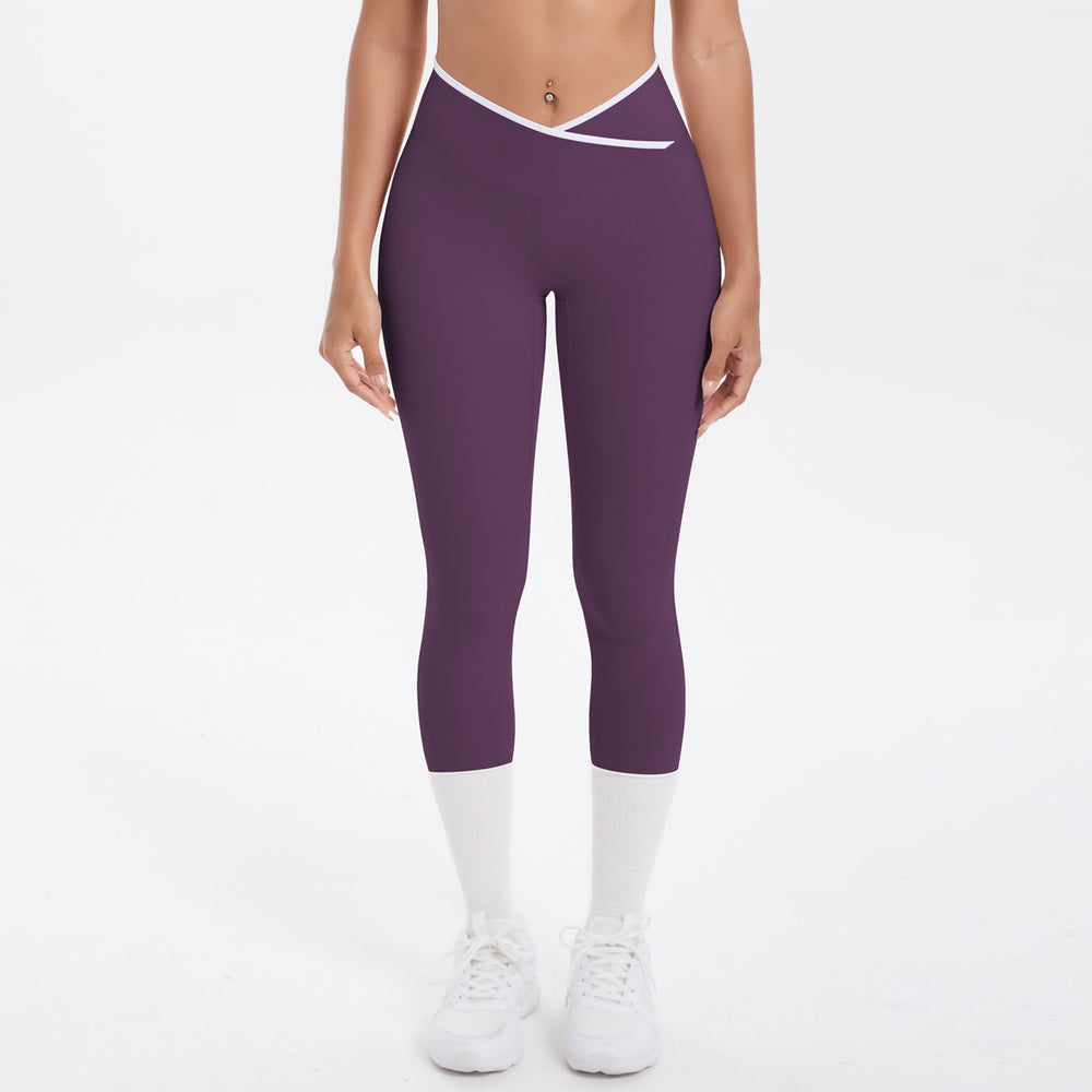 Naked-feel, figure-hugging, high-waisted yoga pants with a contrasting color block design. perfect for outdoor leisure, running, and quick-drying fitness workouts