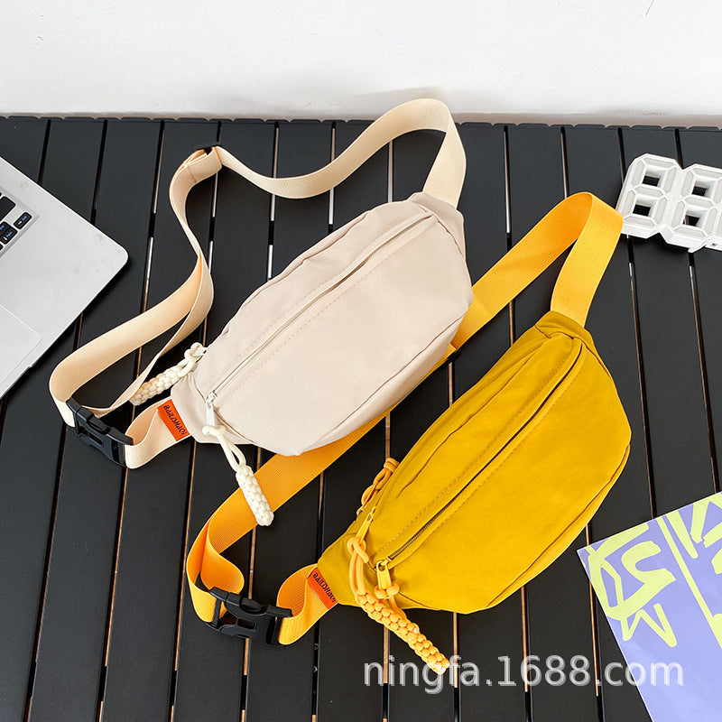 Sports fanny pack men's outdoor fishing anti-splashing fitness running mobile phone storage bag women's commuting travel messenger breast bag