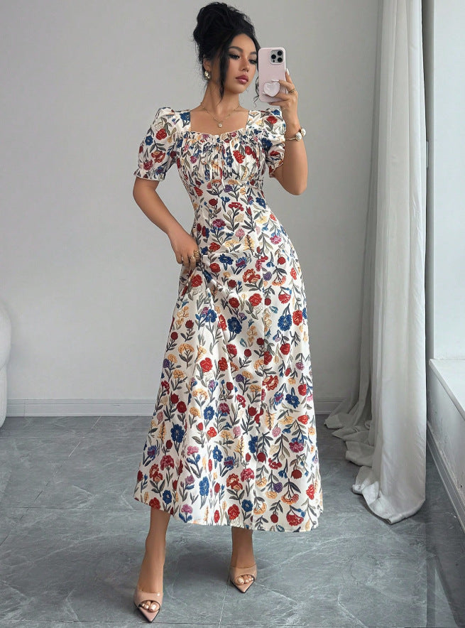 new european and american style floral midi dress with square neck, puff short sleeves, ruched bust, and a-line silhouette