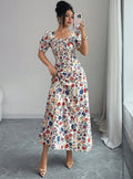 new european and american style floral midi dress with square neck, puff short sleeves, ruched bust, and a-line silhouette