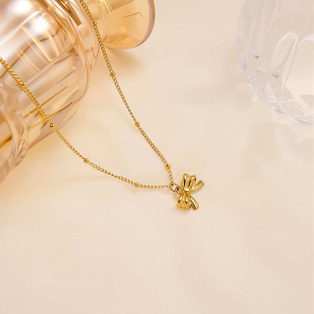 Fresh and sweet "runaway princess" bowknot 18k gold-plated titanium steel necklace - women's luxury design clavicle chain wholesale