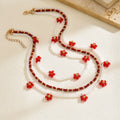 Flower beaded necklace wholesale european and american cross-border autumn and winter accessories multi-layered niche stylish women's rice bead sweater chain