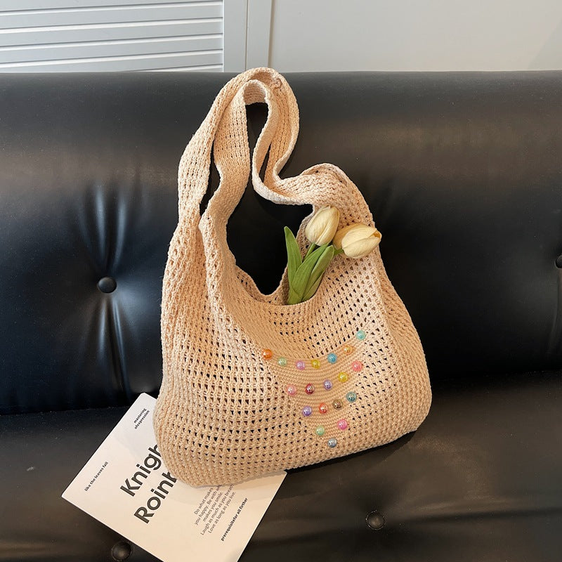 Seaside commuter shoulder tote bag vacation woven bag women's summer colored pearl hollow large capacity underarm bag women