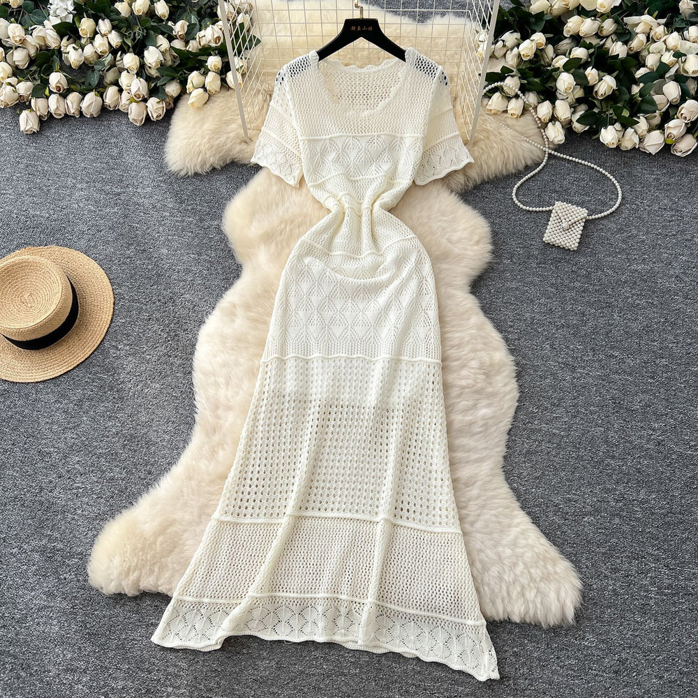 Gentle wind elegant round neck short-sleeved cut out crochet knittingdress women's summerfrench waist-reducing age-reducing sweater skirt