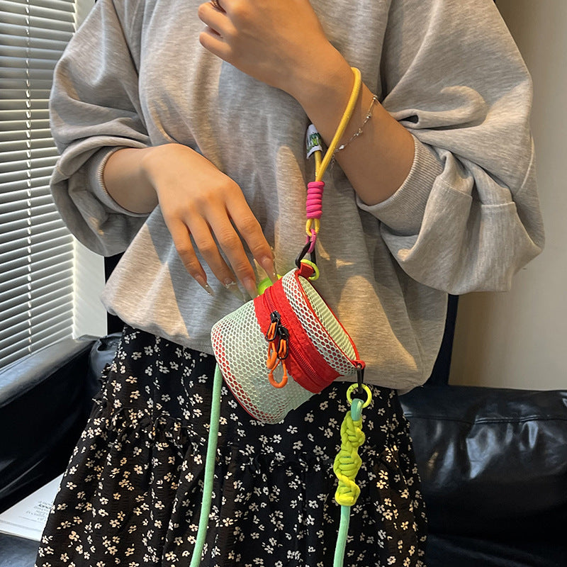 Cross-border exquisite super-fire hollow bag women's 2025 new summer versatile messenger bag mini change bag mouth red envelope