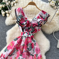 French chic summer dress for women - elegant, high-end, ruffle-trimmed v-neck, slimming, printed maxi dress with a-line skirt
