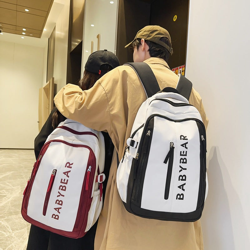 School bag for female college students, Korean version for junior high school students, high school, large-capacity burden reduction backpack for men's middle school students, casual backpack.