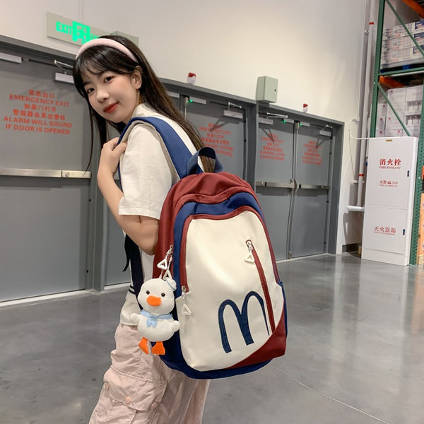 Student schoolbag High value junior high school student fashion backpack Korean version trend large capacity backpack Contrasting color schoolbag