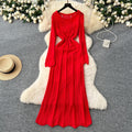 Gentle wind niche styleclassy round neck long sleevescut outknittingdress women's inner suspender skirt layered two-piece set