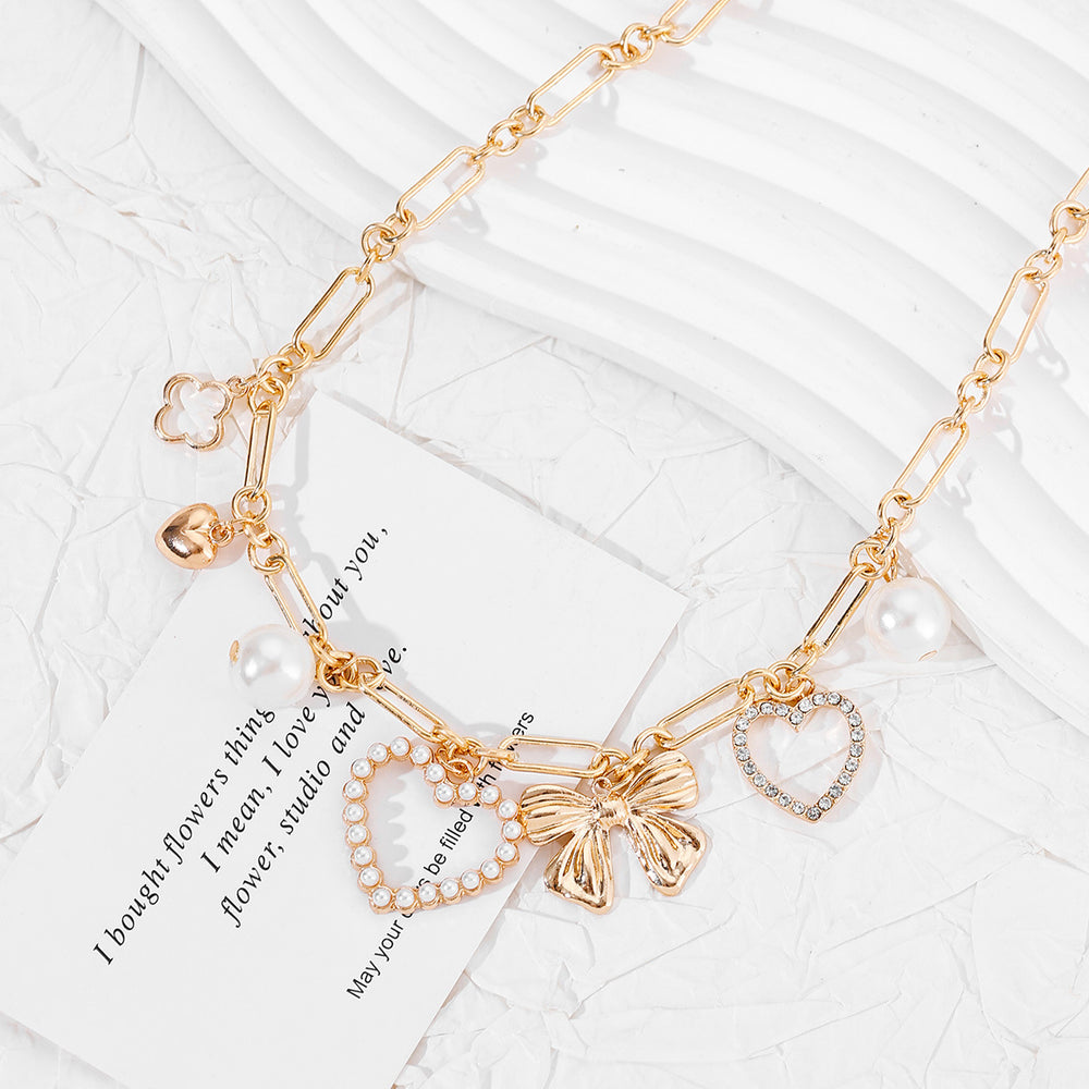 European and american cross-border metal cold style heart bow necklace women's fashion accessible luxury diamond inlaid cut outfall and wintersweater chain