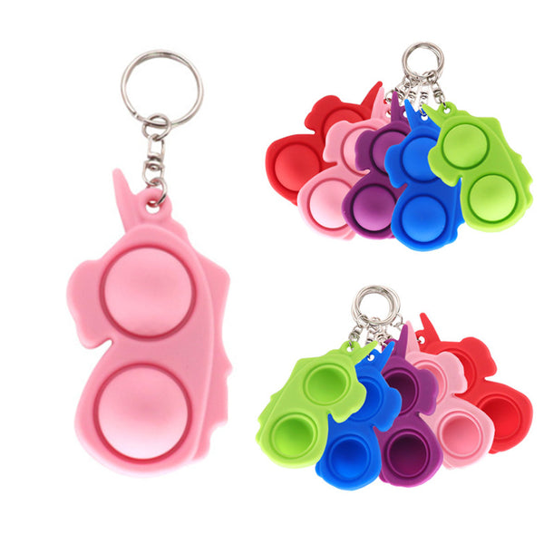Free shipping spot hot-selling dinosaur rodent control pioneer keychain finger bubble music decompression unicorn children's toys