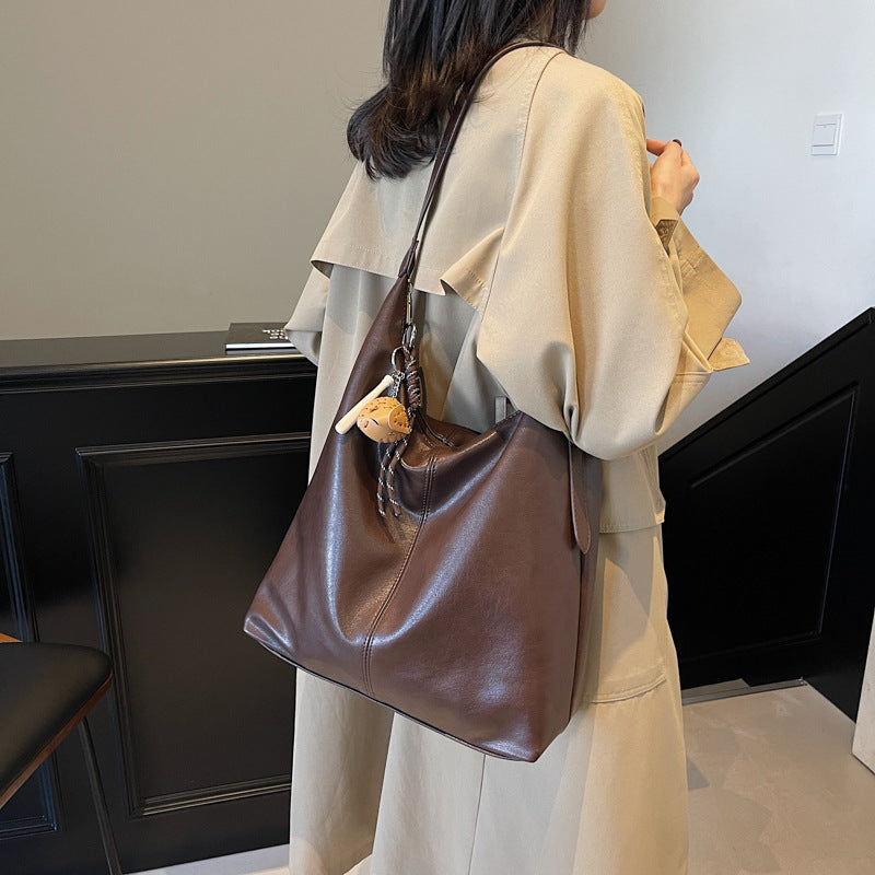 Casual commuting retro large-capacity bag women's 2025 new winter and winter shoulder bag college students class tote bag