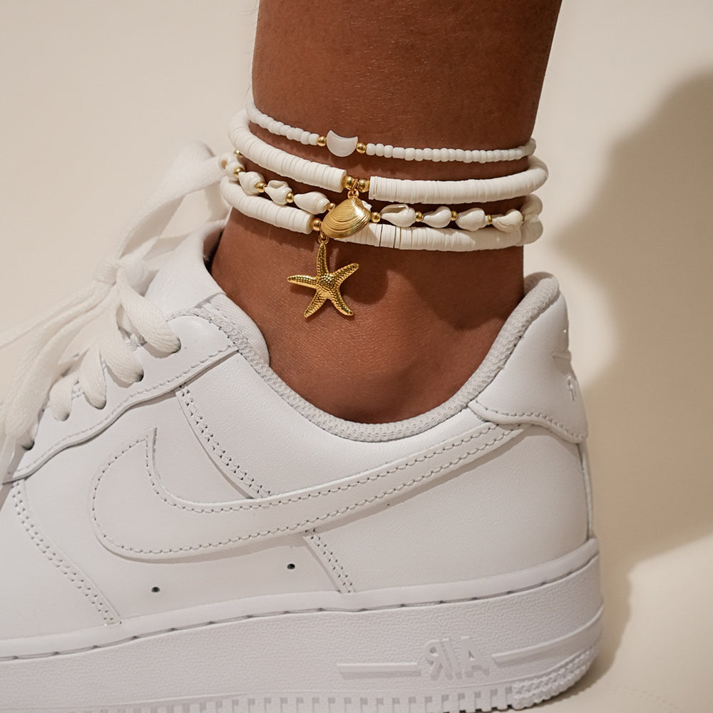 Fashion cross-border vacation style four-piece set shell anklet fashioncasual stacked multi-layered rice beads starfish braided anklet