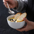 Minimalist pure white ceramic dinnerware set - ideal for restaurants, hotels, and home use. includes plates, rice bowls, soup bowls, and fruit/salad plating dishes
