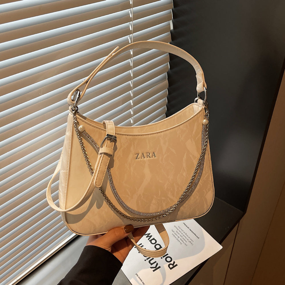 High-end women's bag, large capacity, 2025 new style, niche design, shoulder bag, crossbody bag, understated luxury, textured, commuter tote bag
