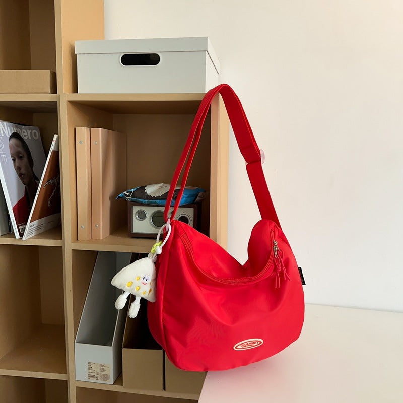 Foreign single nylon cloth bag women's large capacity 2025 new summer versatile shoulder messenger bag casual commuter dumpling bag