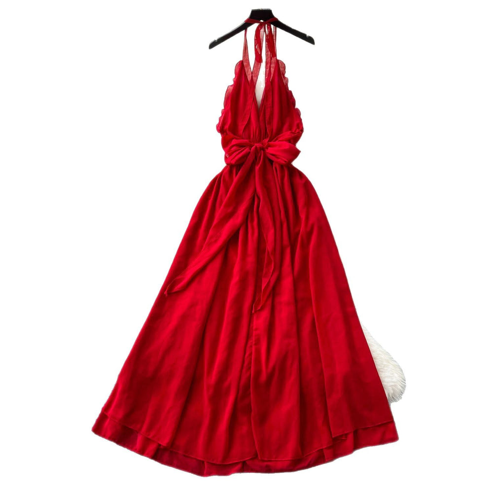 Beach vacation dress women's summer dress sense of design v neck halter suspender backless slit chiffon beach skirt long skirt