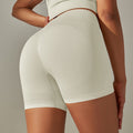fashion seamless knitting peach hip lifting and abdominal high waistpure color yoga pants sports running fitness three-quarter pants