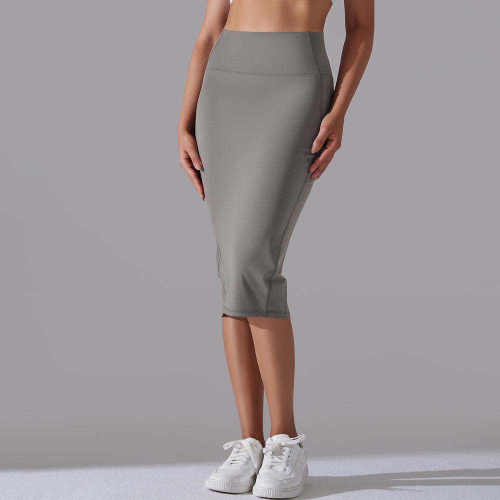 High-waisted, barely-there feel, figure-hugging bodycon skirt. casual, sporty midi skirt with high elasticity and skin-friendly fabric. features a slit and is perfect for yoga or everyday wear
