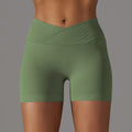 fashion seamless knitting breathable pure color cross waist peach butt yoga shorts running fitness three-quarter pants women